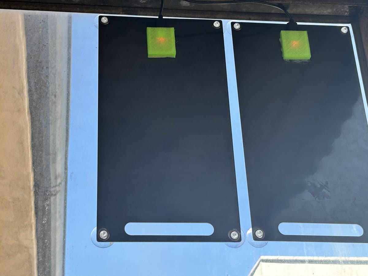 Two compact solar panels providing field power for the EDS installation